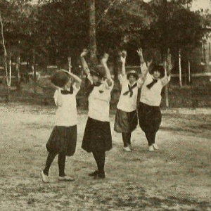 Women playing basket ball